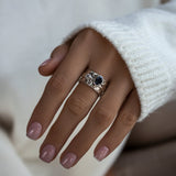 Mechanism Ring with Oval Facet Black Spinel and White Topaz