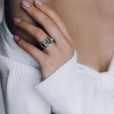 Mechanism Ring with Oval Facet Black Spinel and White Topaz
