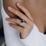 Mechanism Ring with Oval Facet Black Spinel and White Topaz