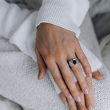 Mechanism Ring with Oval Facet Black Spinel and White Topaz