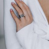 Mechanism Ring with Oval Facet Black Spinel and White Topaz