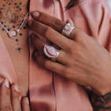 Mechanism Ring with Oval Cabochon Rose Quartz and White Topaz