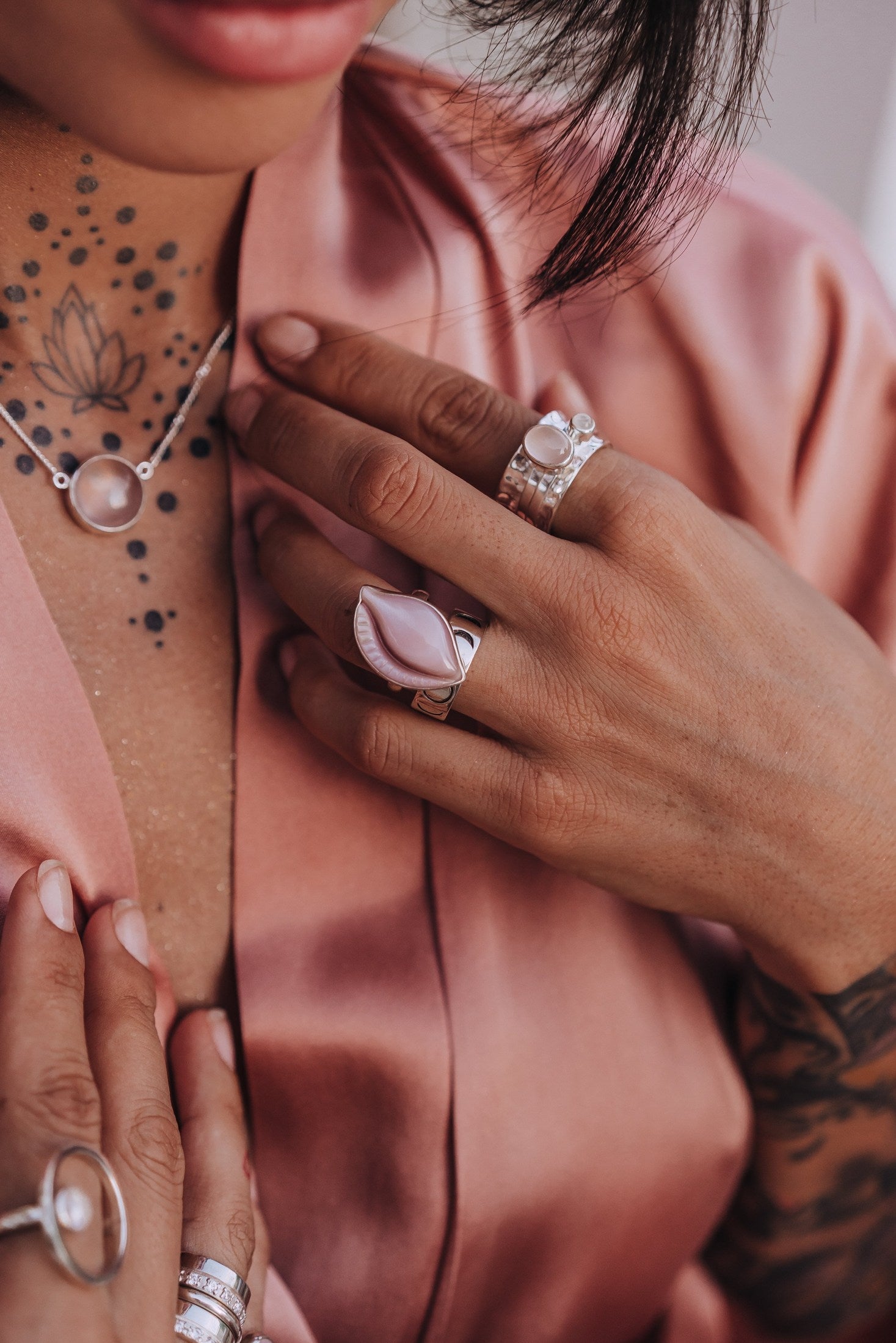 Mechanism Ring with Oval Cabochon Rose Quartz and White Topaz
