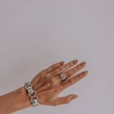 Mechanism Ring with Oval Cabochon Rose Quartz and White Topaz