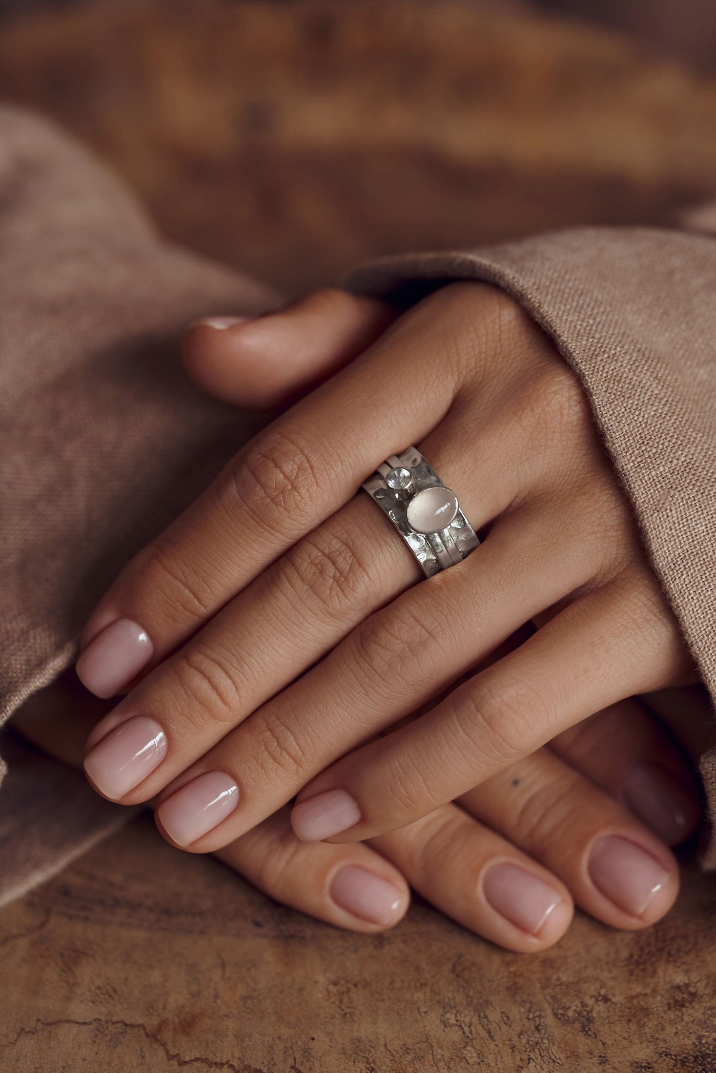 Mechanism Ring with Oval Cabochon Rose Quartz and White Topaz