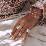Infinity Bracelet With White Pearls