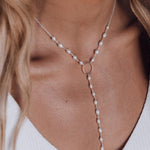 Tie with White Pearls Ring and Silver Plate