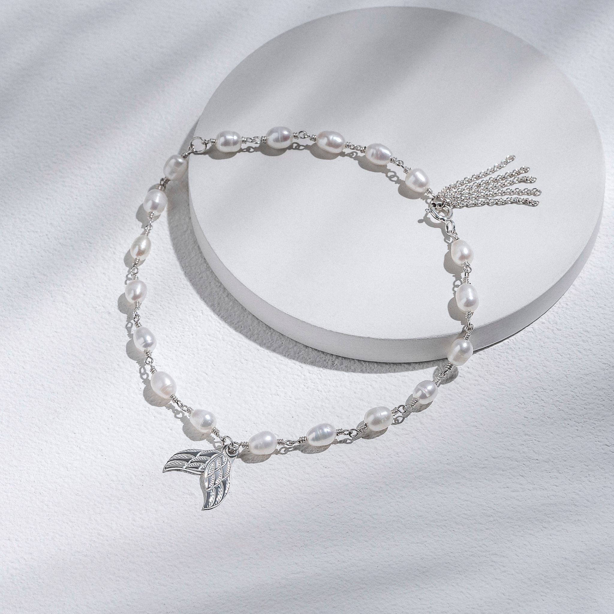 Bracelet With White Pearls & Silver Tassel